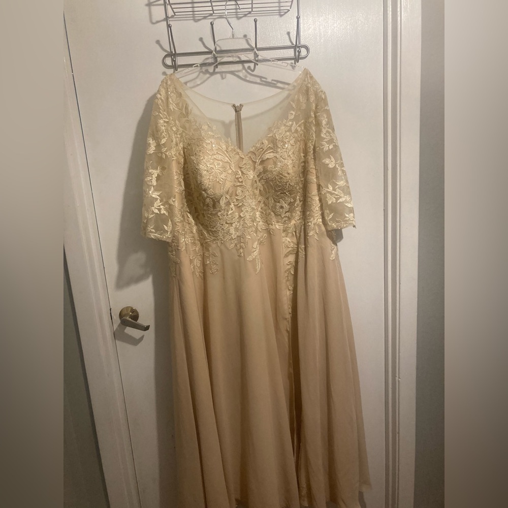 Champagne colored Formal Gown worn once from Jj’s House